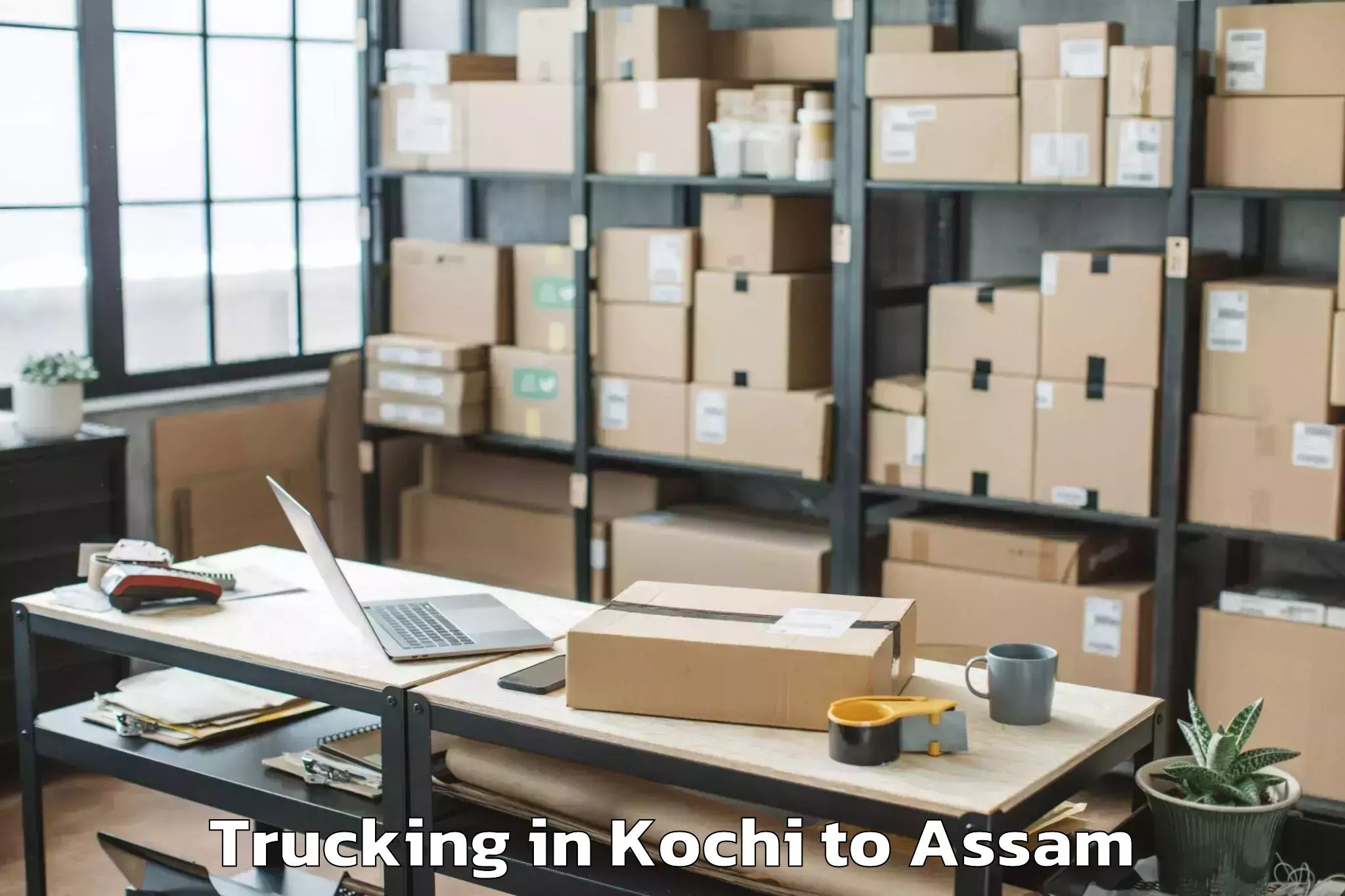 Book Kochi to Moranhat Trucking Online